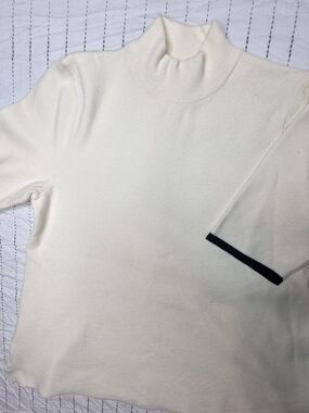 Anthropologie Cream Turtleneck Sweater with Black Sleeve Trim